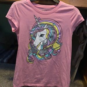 This is a pink unicorn galaxy shirt